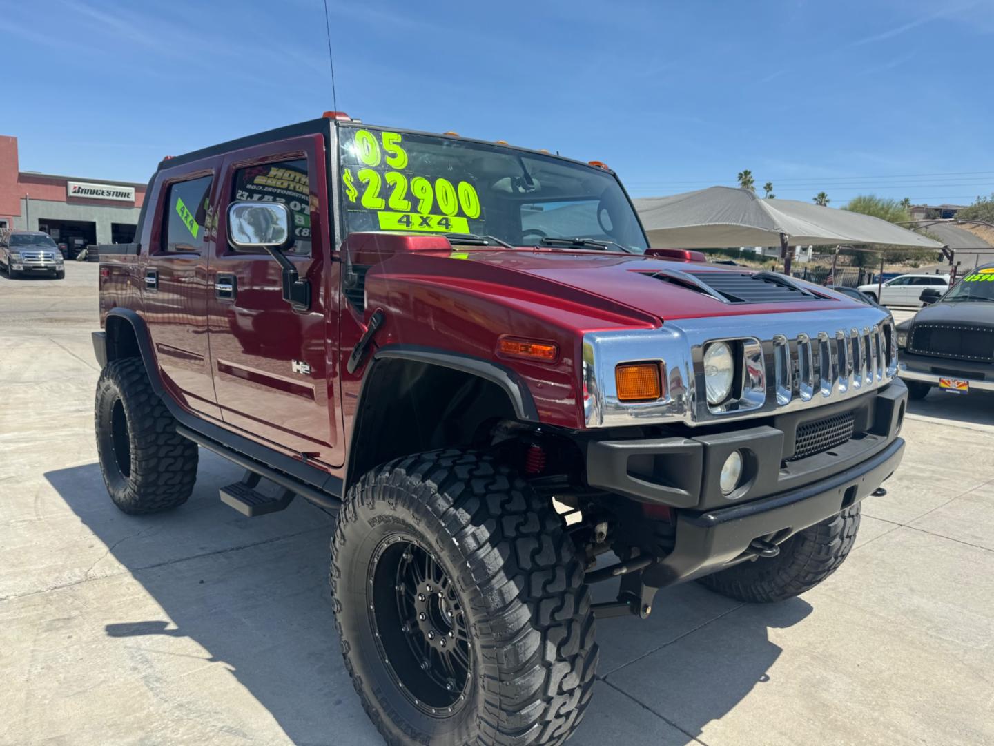 2005 Red /black Hummer H2 SUT , located at 2190 Hwy 95, Bullhead City, AZ, 86442, (928) 704-0060, 0.000000, 0.000000 - 2005 Hummer H2 SUT. only 92k miles. 6.0 V8 4 wheel drive. New transmission with warranty. New shocks. lots of extras .onstar. backup camera, custom stereo. fabtech 6 in lift with 40 in tires. Big Bad Hummer. $22900. Free and clear title. - Photo#0